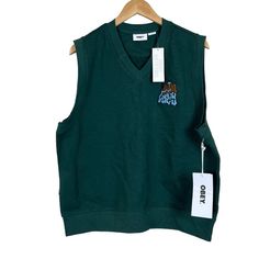 Brand: Obey (Urban Outfitters) Item: Slide Fleece Vest Size: Medium Condition: New With Tags Color: Dark Cedar (Dark Green) Msrp: $85.00 Super Soft Fleece Interior Great Layering Piece Sleeveless Embroidered Logo V Neckline Cotton/Poly Length 25" Pit To Pit 23.5" Fall, Preppy, Collegiate, Academia, Winter Sporty Crew Neck Vest For Streetwear, Sleeveless Streetwear Tops For Fall, Sleeveless Tops For Fall Streetwear, Sporty Cotton Vest For Streetwear, Green Cotton Crew Neck Sweater Vest, Green Cotton Crew Neck Vest, Cotton Vest For Fall Streetwear, Cotton Vest For Streetwear In Fall, Sporty Cotton Vest For Winter