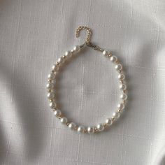 Material: High quality beads and metal hook ; Colors: White pearl beads ; Length: Adjustable, generally between 20-25 cm (adjustable upon request) Weight: Provides comfortable use with its lightweight design; Design: Simple and stylish, handmade design suitable for every combination; Usage: Easy to attach and remove with its secure hook structure; Care Instructions: To preserve the color of the beads, avoid direct contact with water and chemicals. ; Keep it in a dry and closed place when not in Pearl Anklet, Anklet Jewelry, Metal Hooks, Design Simple, Handmade Design, Design Design, White Pearl, Pearl Beads, Pearl White