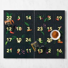 a black calendar with numbers and spices on it