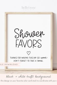 a white frame with the words shower favors on it and a pink flower in front