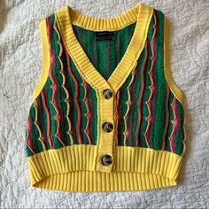 Nwot, Perfect Condition! Vintage Looking Sweater Vest From Uo, Super Soft True To Size, Fits Small-Medium 80s Sweater Vest, Casual Yellow Sweater Vest For Fall, Casual Yellow Sweater Vest For Winter, Casual Yellow Cotton Sweater Vest, Yellow Cotton V-neck Sweater, Retro Green Sweater Vest For Winter, Yellow Vintage Winter Tops, Yellow Vintage Tops For Winter, Yellow Fitted Casual Sweater