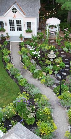 an aerial view of a house and garden