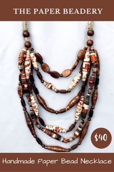 This six strand handmade paper bead necklace is the best accessory to complete your every day look! Handmade paper bead jewelry makes for lightweight and comfortable jewelry and will give your style the statement it needs! Buy your statement beaded necklace today! FREE SHIPPING! #statementjewelry #thepaperbeadery #colorfulnecklace #bohojewelry #chunkynecklace Brown Multi-strand Jewelry With Colorful Beads, Brown Multi-strand Jewelry With Dangling Beads, Brown Multi-strand Necklace With Colorful Beads, Brown Multi-strand Necklace With Large Beads, Long Brown Necklace With Colorful Beads, Brown Jewelry With Wooden Beads, Colorful Beaded Bohemian Jewelry, Brown Costume Jewelry Necklaces With Colorful Beads, Bohemian Colorful Beaded Jewelry