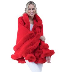 Indulge in the ultimate blend of sophistication and warmth with our faux fur-trimmed cape. This glamorous piece, featuring a plush faux fur trim and a relaxed silhouette, is perfect for elevating your winter wardrobe or adding an extra layer of elegance to any special occasion. Ideal for weddings, evening events, or casual outings, this cape offers versatile styling and unbeatable comfort. Shipping Information: - Ready to ship within 2 days - Fast shipping available upon request - Gift wrapping Faux Fur Wedding, Bridal Coat, Faux Fur Cape, Red Cape, Fur Cape, Poncho Cape, Colour Star, Oversized Cardigan, Red Hoodie