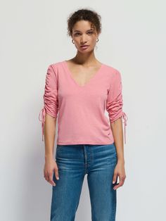 This top is your no-fuss way to add a little romance to any outfit. Binding around the U-neckline, shirred sleeves with ties and subtle shoulder pads (you probably need it in every color). (This one comes in Mauveglow.) | Women's Prima Tee Top in Mauveglow | Ethical Essentials Nation Ltd, Every Color, Tops For Women, Top Tee, Shoulder Pads, Binding, Sleeve Top, Romance, Color