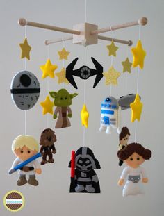 star wars mobiles hanging from the ceiling in a child's room or playroom