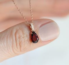 Gorgeous teardrop garnet & diamond necklace. Such a pretty gift for her; your mom, wife, daughter ... This crystal gemstone necklace is a available in 14k/18k rose/white/yellow gold- please select metal from drop down menu. Price is for a length of 15 to 17 inches. If you wish a longer one, there is some extra fee.
Please select gemstone from drop down menu.
Item details: 14k/18k/rose white yellow gold 8x5mm garnet diamonds, color F-G, VS clarity solid gold chain
The necklace will be shipped in Gold Necklace Red, Red Garnet Necklace, Red Stone Necklace, Sapphire Wedding Band, Gold Pendant Jewelry, Necklace Rose Gold, Solid Gold Chains, Garnet Necklace, Buy Necklace