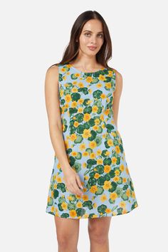 Floral printed mini shift dress featuring gorgeous hand painted nasturtium flowers. This sleeveless style is made of cotton- fitted bodice into a line shaped skirt - sleeveless style - side ties for a more cinched look - invisible back zipper - made of a smooth cotton- available in blue Product Code: PGFY180 Nasturtium Flowers, Picnic Dress, Princess Highway, Baby Outerwear, Dress Princess, Colorblock Dress, Mini Shift Dress, Smock Dress, Shop Swimwear