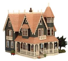 a large doll house with many windows and balconies on the top floor, in front of a white background