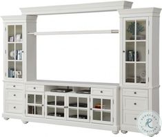 a white entertainment center with glass doors and shelves