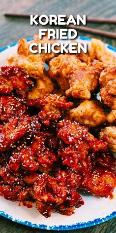 fried chicken on a plate with sauce and chopsticks next to it that says korean fried chicken