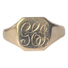 This sweet signet is modelled in 9ct gold and has a face with the initials 'GEJ' engraved into it. Fully hallmarked London 1941. Ring Size: W or 11 Face Dimensions: 11.5x11.5mm Weight: 4.9g Luxury Vintage Signet Ring, Signet Style Engagement Ring, Face Dimensions, Gold Signet Ring, La Face, Signet Ring, A Face, Cuff Bracelets, Initials