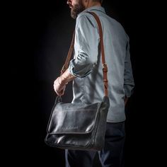 If you think it is time to ditch your old, tired-looking messenger bag, then check out our newest addition to the ever-popular shoulder carryall. No polyester material or plastic buckle in sight, this handcrafted messenger bag shows off high quality saddle leather and antique-coloured hardware. Long-term use will produce a deeper tone in the leather, adding character to it and enhancing the bag’s overall appearance. Based on the traditional school satchel design, the bag has a large flap closure Rugged Rectangular Leather Bag, Laptop Purse, Brown Leather-handled Crossbody Briefcase, Leather Computer Bag, Vintage Leather-handled Briefcase Shoulder Bag, Black Leather Messenger Bag, Work Bags Laptop, Leather Messenger Bag Laptop, Leather Tote Bag Women