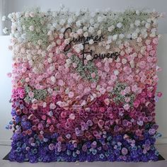 a large flower wall with flowers on it