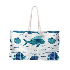 Our oversized Weekender Tote is perfect for your weekend at the beach or in town. The wide-mouthed, durable bag holds a generous amount of personal items and is easily held by its thick rope handles. .: One size: 24" x13" (60.9 cm x 33 cm) .: 100% Spun Polyester .: T-bottom .: Cream sheeting interior lining .: NB! Size tolerance 0.75" (1.9 cm)) .: Assembled in the USA from globally sourced partsImage by [phoelixDE / Shutterstock] Blue Large Capacity Weekender Bag For Vacation, Casual Beach Tote Travel Bag, Casual Weekender Bag For Summer Beach, Large Capacity Blue Weekender Bag For Vacation, Casual Summer Weekender Bag For Shopping, Summer Beach Weekender Bag In Rectangular Shape, Large Capacity Tote Weekender Bag For Beach, Coastal Rectangular Bag For Daily Use, Summer Rectangular Weekender Bag For Beach