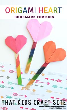 origami heart bookmark for kids that kids crafts are made out of paper