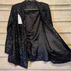 Wait For You Sequined Jacket Nwt Fully Lined Color Black Size Large, And A Medium Polyester Spandex With Tags Never Been Worn Excellent Condition Great For Taylor Swift Concerts Black Party Outerwear For Party Season, Black Long Sleeve Blazer For Party, Black Party Season Blazer, Black Outerwear For Party Season Night Out, Black Long Sleeve Outerwear For Party Season, Black Sequined Outerwear For Fall, Black Sequined Outerwear For Party Season, Winter Black Rhinestone Outerwear, Black Sequin Long Sleeve Blazer