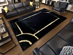 a living room filled with black furniture and decor