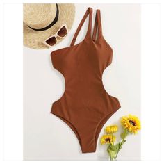 Absolutely Gorgeous And Stunning One Piece Swimsuit. Nice Brown Color Not Too Dark Either. Open Back Also. Beautiful. Wonderful Fit, True To Size. Brown One-piece Swimwear For Summer, Trendy Cutout Bodysuit For The Beach, Brown Summer Bodysuit For Poolside, Brown Bodysuit For Poolside Summer, Summer Brown Lined Bodysuit, Casual Brown One-piece Swimwear, Spring Sleeveless Brown Swimwear, Brown Beachwear Bodysuit For Vacation, Trendy Brown Swimwear For Summer