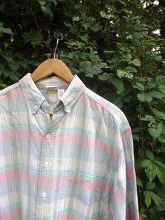 Check pattern pastel button down shirt in size MEDIUM by Baja Beach Club. This vintage gem is a great find and totally unique since it's hard to find this plaid check desing in these more minimalist and pastel colors! Such a nice find and totally could work with tons of different styles too! Thanks for visiting www.etsy.com/shop/fleecenstuff - take a look around the shop for more vintage 80s and 90s clothing too! Size: Medium Armpit to Waist: 17 inches Neckline to Waist: 28 inches Armpit to Armpit: 2 inches 3 *Live outside of the USA and Canada? Contact us for a shipping quote. Facebook: https://www.facebook.com/fleeceandstuff2015/ Instagram: https://www.instagram.com/fleecenstuff/ @fleecenstuff Pinterest: https://www.pinterest.ca/fleecenstuff Vintage Jackets 90s, Red Sox Shirt, Pastel Shirt, Soft Goth, 80s Shirts, Space Outfit, Oversized Button Down Shirt, Vintage Calvin Klein, Grunge Vintage