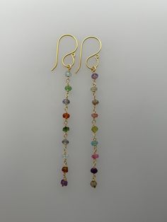 Absolutely stunning pair of faceted multi-gem long drop earrings in solid 18k gold.  The earwires are beautifully detailed for a feminine & elegant look.  The drop measures approx: 6.5cm These are handmade to order, so please allow up to 10 working days for delivery. You can view more beautiful jewellery here: LapisAndCoral.etsy.com Cheap Long Drop Jewelry With Dangling Beads, Cheap Gold Beaded Dangle Earrings, Luxury Dangle Linear Earrings With Gemstone, Yellow Gold Gemstone Linear Drop Earrings, Boho Jewelry Diy, Wire Jewelry Patterns, Long Drop Earrings, Earring Tutorial, Handmade Wire Jewelry