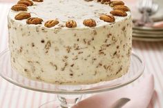 there is a cake with nuts on it