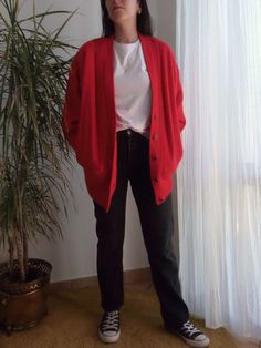 "Vintage angora and lambswool red cardigan by the brand Your Sixth Sense. 80's angora bright red knit cardigan/jacket with pockets. Fully lined. Fits like a S/M. Measurements lying flat: Bust: 19\" / 48cm Length: 28.5\" / 72cm Very good condition." Red Relaxed Fit Winter Sweater, Red Relaxed Fit Sweater For Winter, Vintage Oversized V-neck Outerwear, Red Oversized Wool Outerwear, Red Wool Oversized Outerwear, Classic Red Outerwear For Layering, Oversized Red Wool Outerwear, Red Relaxed Fit Winter Outerwear, Red Relaxed Fit Outerwear For Winter