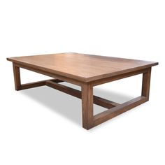 a wooden coffee table with one end missing