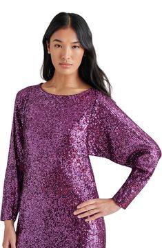 Sparkling sequins lend divine shine to a party-ready dress cut in a relaxed fit and fashioned with long sleeves and a leggy silhouette. 33" length (size 8) Slips on over head Bateau neck Long sleeves Lined 95% polyester, 5% spandex Hand wash, dry flat Imported Purple Sequin Dress, Aubergine Color, Long Sleeve Cocktail Dress, Bateau Neck, Dress Home, Deep Teal, Dress Cuts, Purple Dress, Sequin Dress