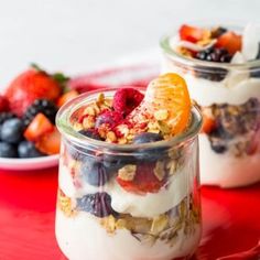 yogurt parfait in a glass jar with fruit on top