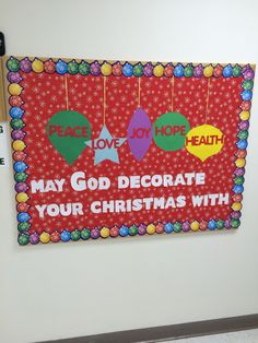 a bulletin board that says, may god decorate your christmas with peace love joy health