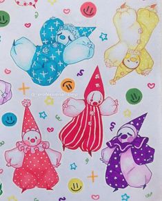 some very cute cartoon characters on a white paper with many other things in the background