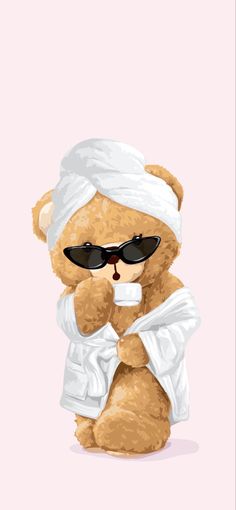 a brown teddy bear wearing sunglasses and a white towel on its head sitting in front of a pink background