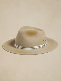 Handcrafted from a unique 200-gram blend of free-range Bolivian and Argentine wool, this Hampui hat has a striped hatband, an inentionally-distressed finish, and stamped silver medallions with turquoise cabochons.  HAMPUI: Rugged, yet always-refined, Cruise Outfits, Free Range, Hat Band, Curator Style, Winter Sale, Natural World, Baby Shop, Handmade Natural, Fashion News