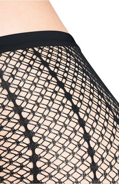 Vertical patterning defines these elegant tights made using a seamless technology that provides all-day comfort. Recycled polyamide/elastane   Machine wash, dry flat   Made in Italy Black Seamless Micro-elastic Hosiery, Black High-stretch Seamless Tights, Black High Stretch Seamless Tights, High Stretch Seamless Black Tights, Black Stretch Fishnet Tights, Black High Stretch Mesh Hosiery, Black Micro-elastic Seamless Tights, Black Mesh Stretch Legwear, Black Stretch Mesh Legwear