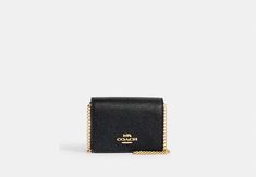 COACH® Outlet | Mini Wallet On A Chain My Lockme Chain Pochette, Classic Formal Wallet With Chain Strap, Classic Everyday Rectangular Wallet On Chain, Classic Crossbody Wallet With Chain Strap, Classic Gold Wallet On Chain For Travel, Classic Evening Wallet On Chain With Card Slots, Formal Rectangular Wallet On Chain With Card Slots, Classic Gold Crossbody Wallet, Classic Everyday Wallet On Chain With Card Slots