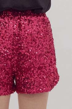 Turn heads in our high-waisted fuchsia sequin shorts! These bold and vibrant shorts are designed to make a statement, with eye-catching fuchsia sequins that shimmer with every step. The high-waisted fit flatters your figure, providing both style and comfort. Perfect for a night out, festival, or any occasion where you want to stand out, these shorts pair effortlessly with your favorite tops, from a sleek bodysuit to a casual tee. Add a pop of color and sparkle to your wardrobe with our dazzling Sequin Shorts For Night Out And Party Season, Sequin Party Shorts, Glamorous Summer Shorts, Party Shorts With Sequins, Disco Style Glitter Bottoms For Summer, Glitter Disco Bottoms For Summer, Party Sequined Shorts, Summer Disco Glitter Bottoms, Sequin High-waisted Shorts For Summer