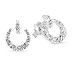 Bold and contemporary, these diamond drop earrings elevate your evening attire. Fashioned in 18K white gold, each luxe drop showcases an open circle -shaped dangle adorned in graduating round brilliant cut diamonds. A diamond pave lined huggie as the post. Captivating with 0.50 ct. t.w. of diamonds and a bright polished shine, these post earrings secure comfortably with friction backs.
0.50 carat 
14k white gold
The earring design can be customized to suit your part Elegant Open Circle Sterling Silver Earrings, Modern Cubic Zirconia Earrings With Halo Design, Modern Diamond Halo Earrings, Modern White Gold Halo Earrings, Elegant Formal Circular Earrings, Modern White Gold Earrings With Brilliant Cut, Modern Halo Design Drop Earrings, Modern Drop Earrings With Halo Design, Modern White Gold Brilliant Cut Earrings