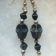 Hand Made Skull Earrings. These Beautiful Unique Skull Earrings Are Perfect For Halloween. Get Them Before They Sell Out. I Still Have The Short Black Dangling Skulls, And Long Black Dangling Skulls. I'll Be Making And Posting More Soon. Made Jewelry, Black Skulls, Skull Earrings, Sell Out, Jewelry Inspo, Hand Made Jewelry, Earrings Color, Long Black, Silver Beads