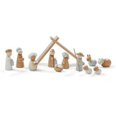 a nativity scene with figurines in the shape of a manger