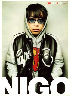 a young man wearing sunglasses and a leather jacket with the words nigo on it