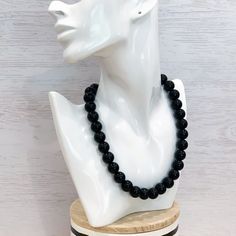 This classic unisex black necklace was hand beaded using 14mm round black glass beads - perfect for everyday wear! The necklace measures your choice of 18, 22, 26, or 30 inches in length and is securely fastened with a silver clasp. The end result is a versatile piece that goes with everything! Check out more fabulous jewelry and enter my shop here: https://www.etsy.com/shop/jewelbytessyla View the positive feedback I've received from customers and check out some beautiful art prints for nursery Classic Black Beaded Necklaces With Polished Beads, Black Necklaces With Round Beads For Everyday, Classic Black Beaded Necklace With Polished Beads, Black Gemstone Bead Necklaces, Black Gemstone Beads Necklace, Classic Black Necklaces With Black Beads, Black Beaded Necklaces With Round Beads For Gift, Black Beaded Necklaces For Everyday, Classic Black Necklace With Round Beads