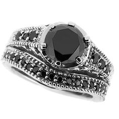 a black diamond ring set on top of each other