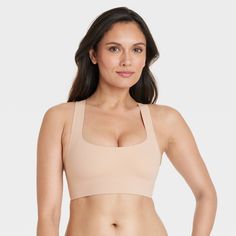 The Luxury Collection Bonded Microfiber Racerback Scoop Bralette from Auden™ combines a sports bra design with elegant style. The racerback bralette is made of bonded microfiber fabric with added spandex for a flexible fit that moves with you. Featuring a pullover style, comfort elastic and unlined cups, you’ll want to live in this bralette from morning to night. Auden™: Comfort true to every shape & hue. Stretch Scoop Neck Bra With Medium Bust Support, Light Support Scoop Neck Bra, Solid Color Scoop Neck Bra With Light Support, Seamless Racerback Bra With Medium Support, Fitted Full Coverage Seamless Sports Bra, Athleisure Seamless Racerback Bra, Sporty Fitted Scoop Neck Bra, Medium Support Racerback Bra With Removable Pads, Racerback Bra With Seamless Construction And Medium Support