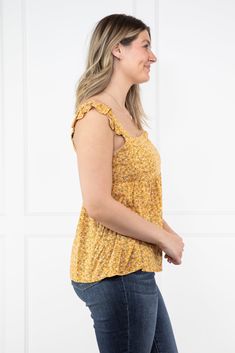 Go wild with the Wild As A Cowgirl Tank Top by Heyson! This top features floral patterns, a hi-lo hem, a half button down front, and a boat neckline. Pair with your favorite denim and embrace your wild side! Fabric: 100% Viscose Measurements: Bust (Size M): 17.5" Length (Size M): Front: 25.5", Back: 27.5" True To Size S 0-6 M 6-10 L 10-14 Denim Jacket Short, Denim Joggers, Go Wild, Graphic Tops, Tall Girl, Boot Cut Denim, Boat Neckline, Wide Leg Denim, Cardigan Tops