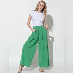 Brand New Chic Green Relaxed Fit Bottoms, Green Versatile Bottoms For Spring, Versatile Green Bottoms For Spring, Green Wide-leg Pants For Day Out, Wide Leg Green Pants For Day Out, Green Stretch Wide Leg Pants For Spring, Versatile Green Bottoms For Day Out, Green Relaxed Fit Pants For Day Out, Green Trousers For Day Out