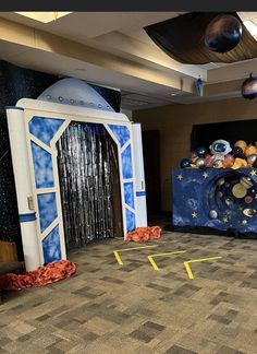 an indoor space themed stage set up for a children's party