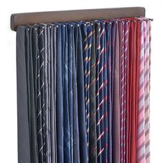 a rack with ties hanging from it's sides