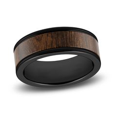 a black ceramic ring with wood inlay