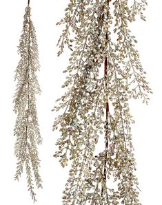 two christmas tree ornaments hanging from the ceiling